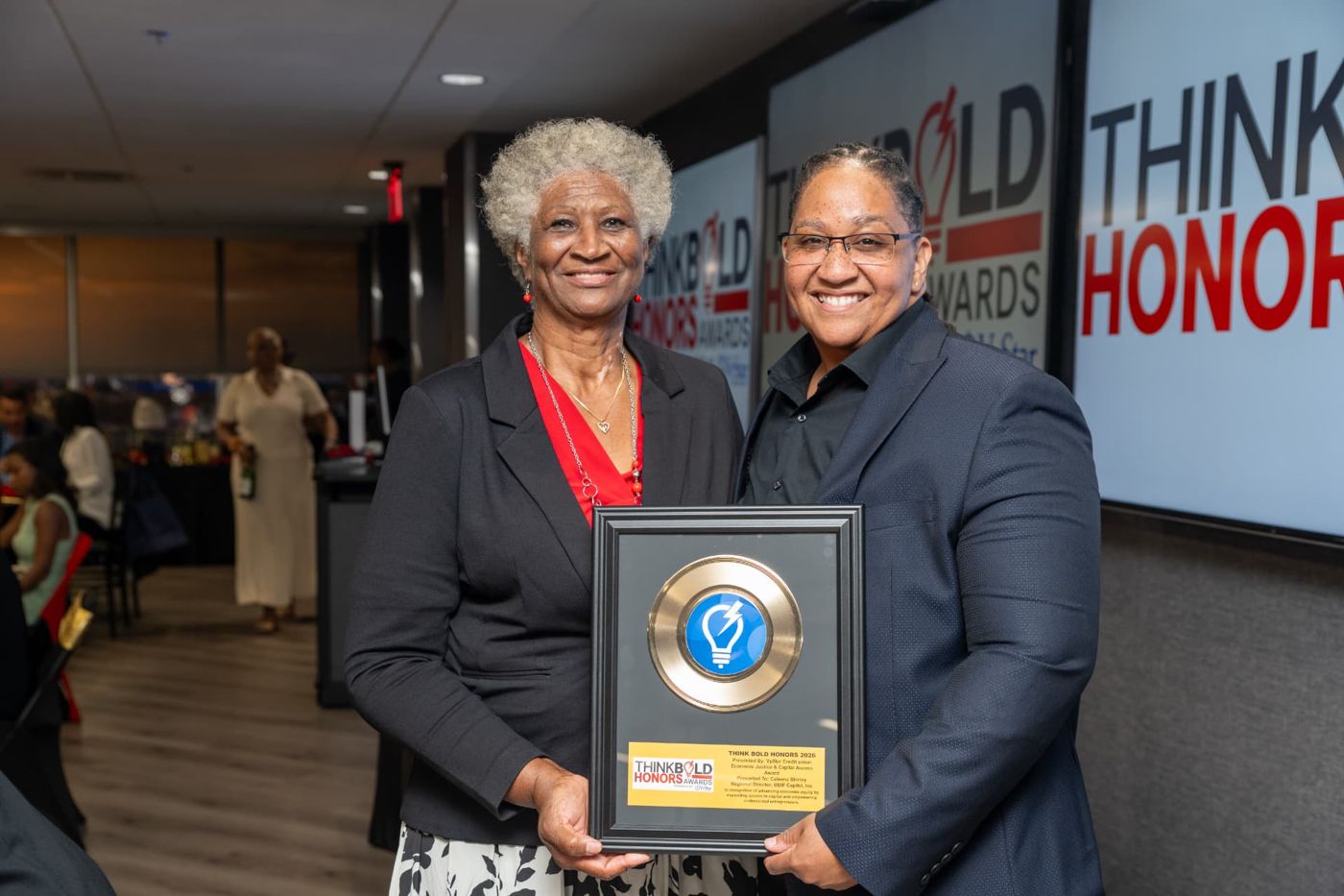 Caleena Shirley receiving the Economic Justice & Capital Access Award