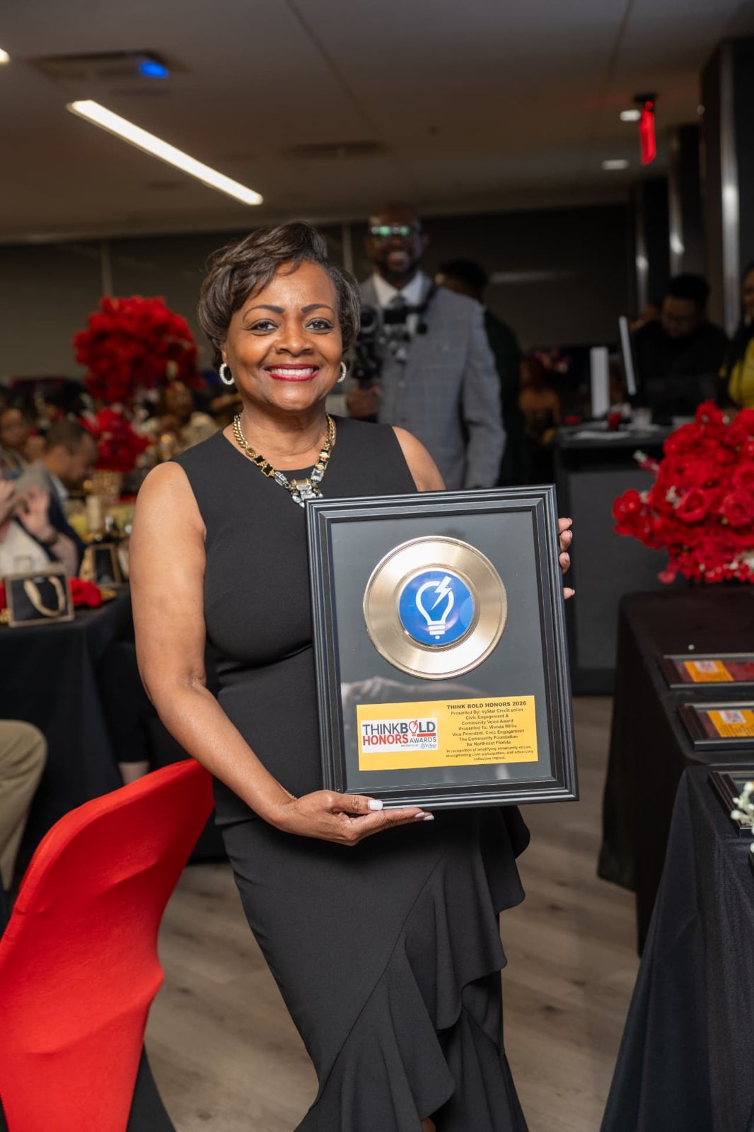 Wanda Willis receiving the Civic Engagement & Community Voice Award
